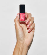 Hand model with JINsoon Aura against a white background (Mid skin tone).