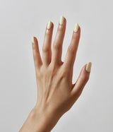 Hand with fair skin tone wearing JINsoon Georgette nail polish against a white background