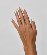 Hand with medium skin tone wearing JINsoon Georgette nail polish against a white background