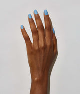 Hand model with JINsoon Aero against a white background (dark skin tone).