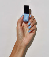 Hand model with JINsoon Aero against a white background (mid skin tone).
