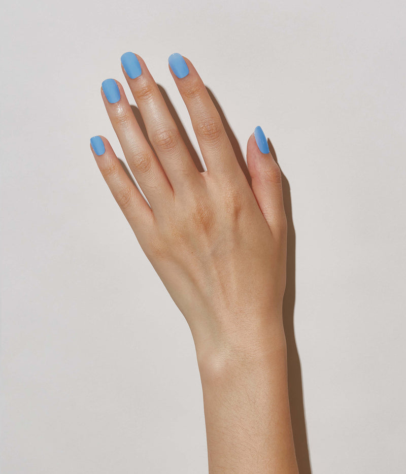 Hand model with JINsoon Aero against a white background (pale skin tone).