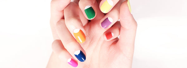 Hands with colorful nail design