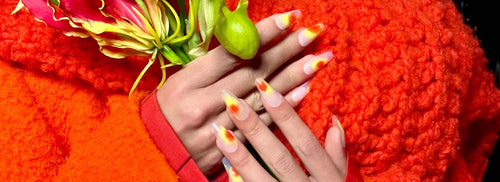 orange jacket Aura Nails