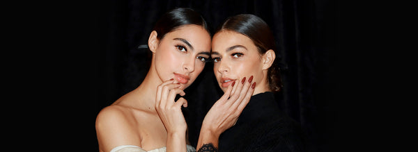 Two models showing their hands and manicure