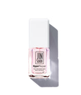 Pink nail treatment bottle with 'JINsoon' branding on a white background