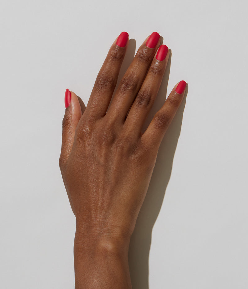 Hand model with JINsoon Ardor against a white background (Deep skin tone).